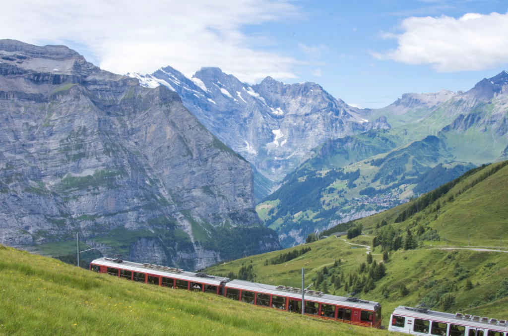 Train traveling through the Swiss mountains